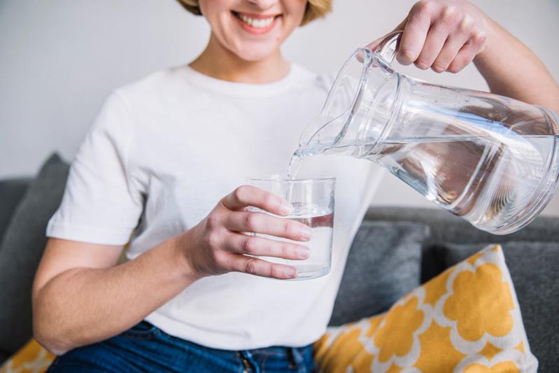 woman pouring water