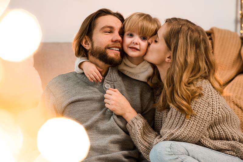 Family hugging during a Thanksgiving celebration