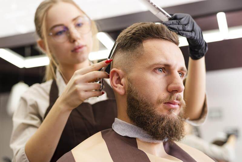 Men getting a canadian haircut at a barbershop